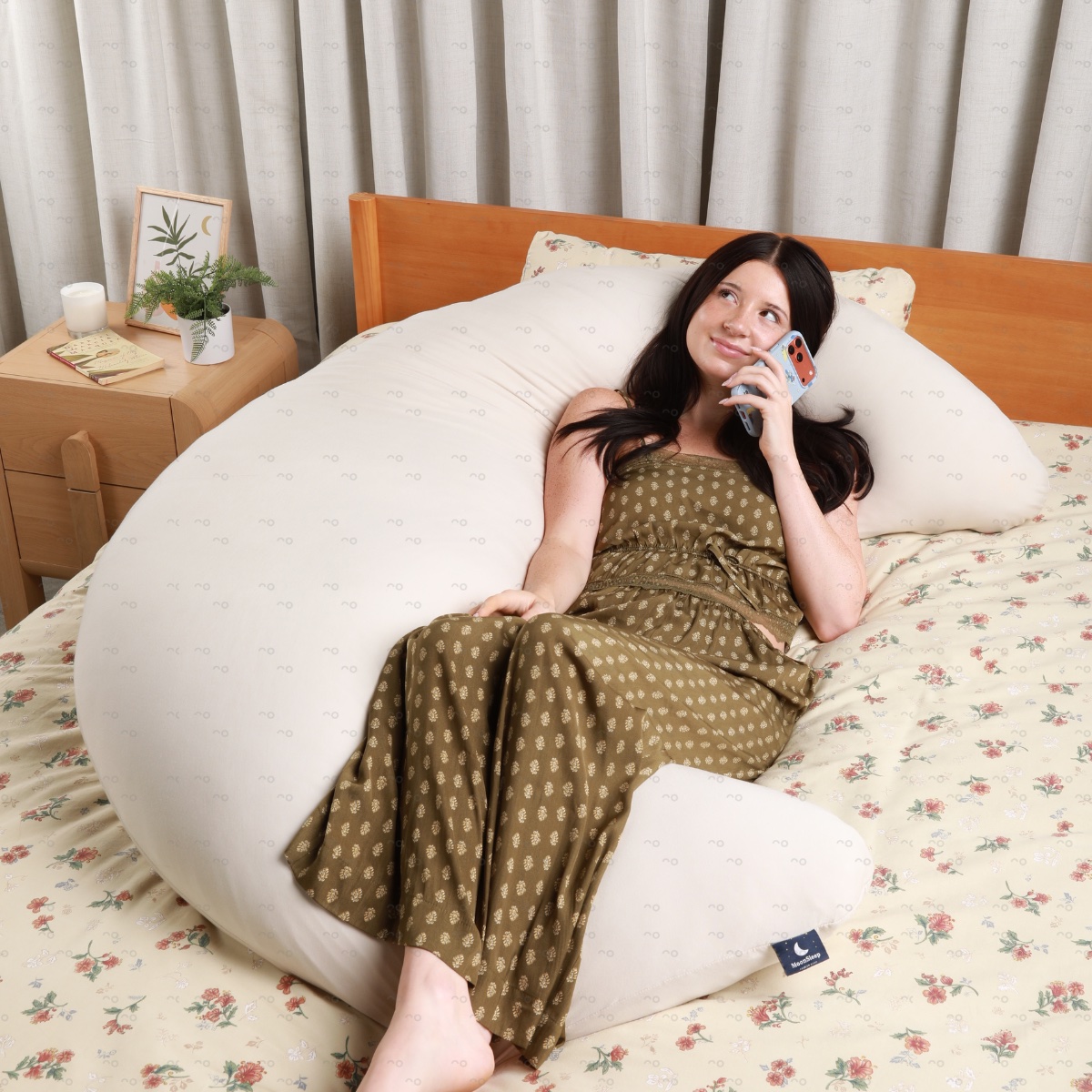 MoonSpoon styled across the bed as a hammock shape